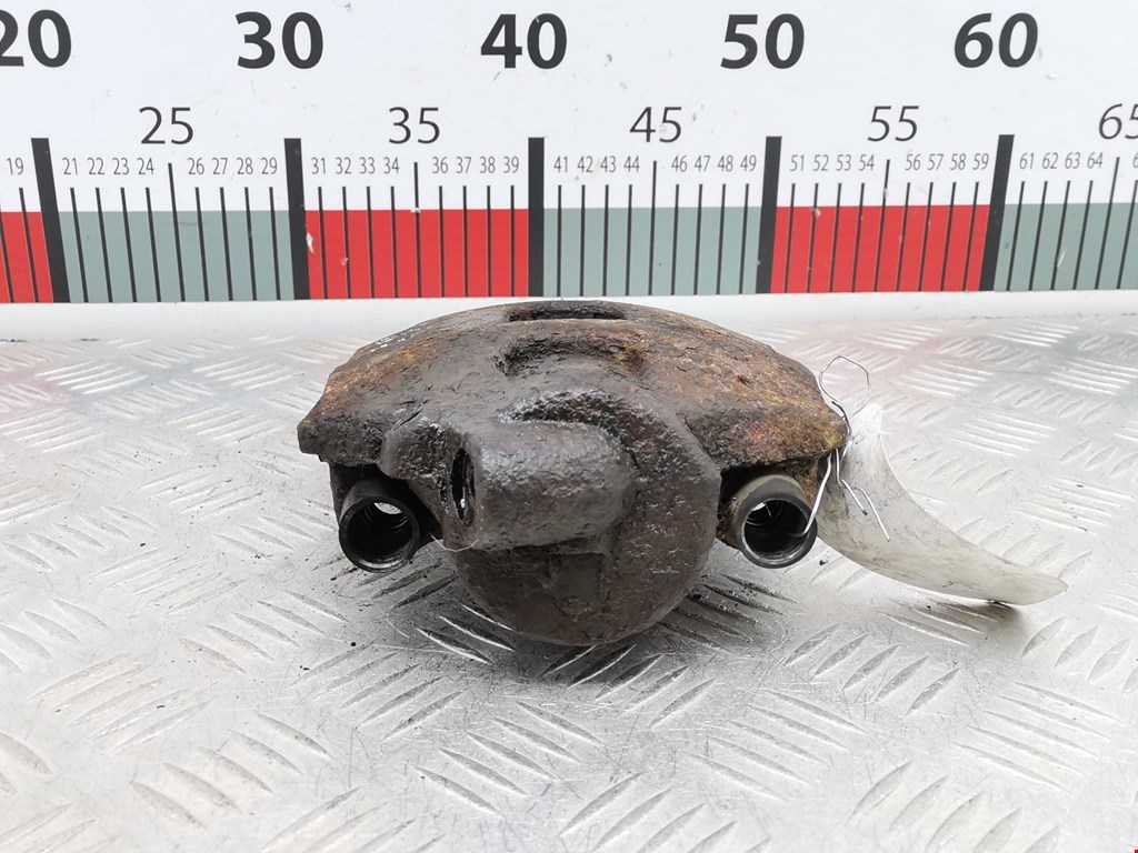 Суппорт передний левый FORD Fiesta 1995-2001