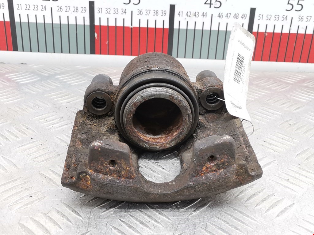 Суппорт передний левый FORD Fiesta 1995-2001