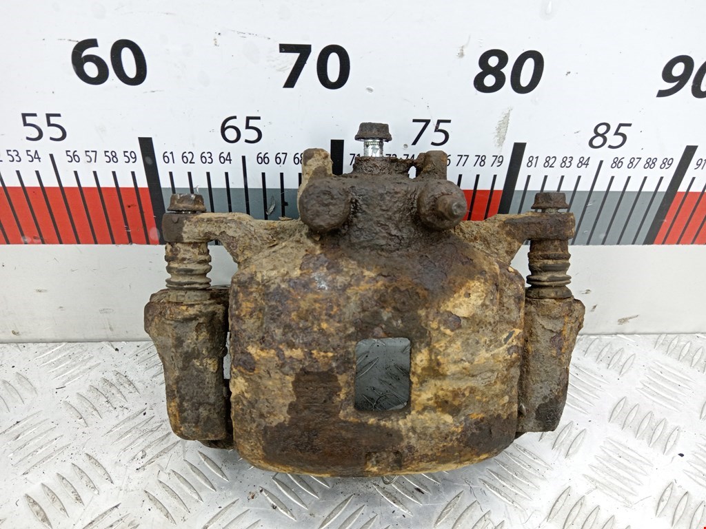 Суппорт передний левый Mitsubishi L200 4 (2006-2015)