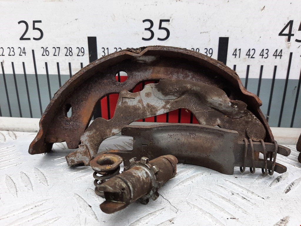 Механизм ручного тормоза (ручника) KIA Rio II 2005-2011