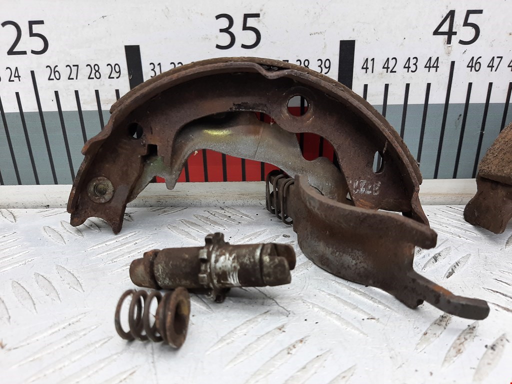 Механизм ручного тормоза (ручника) KIA Rio II 2005-2011