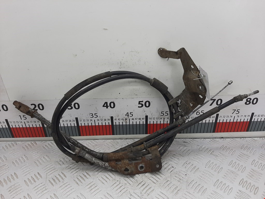 Трос стояночного тормоза левый/правый OPEL Corsa D 2006-2014