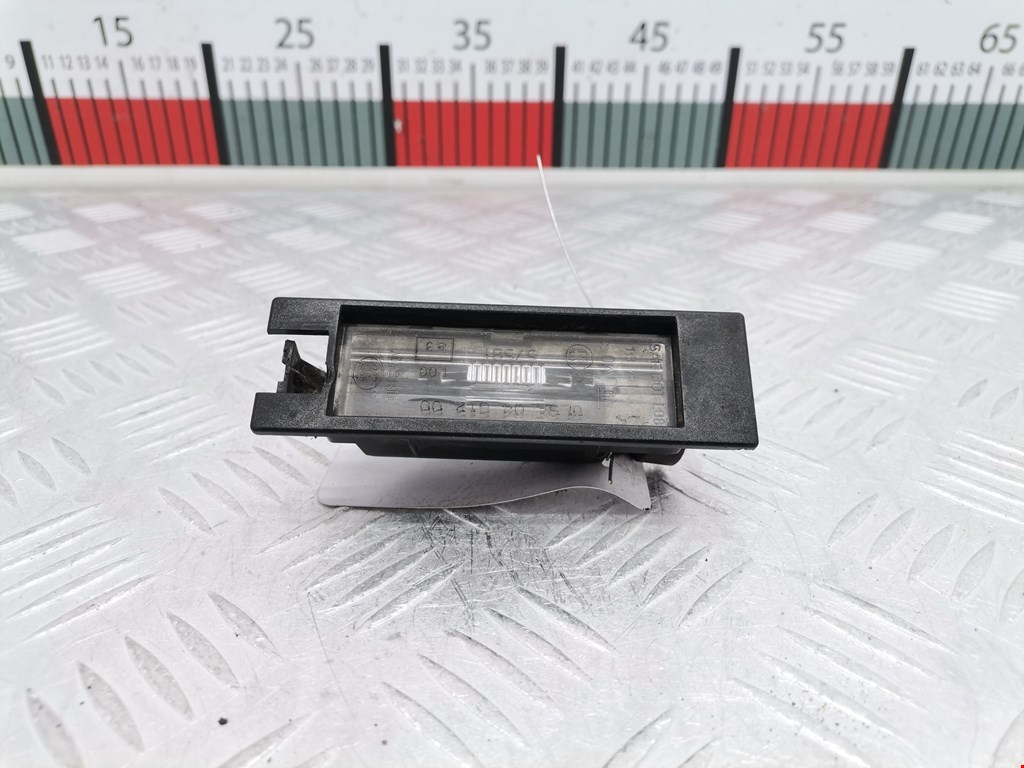 Фонарь подсветки номера OPEL Astra J 2009-2017