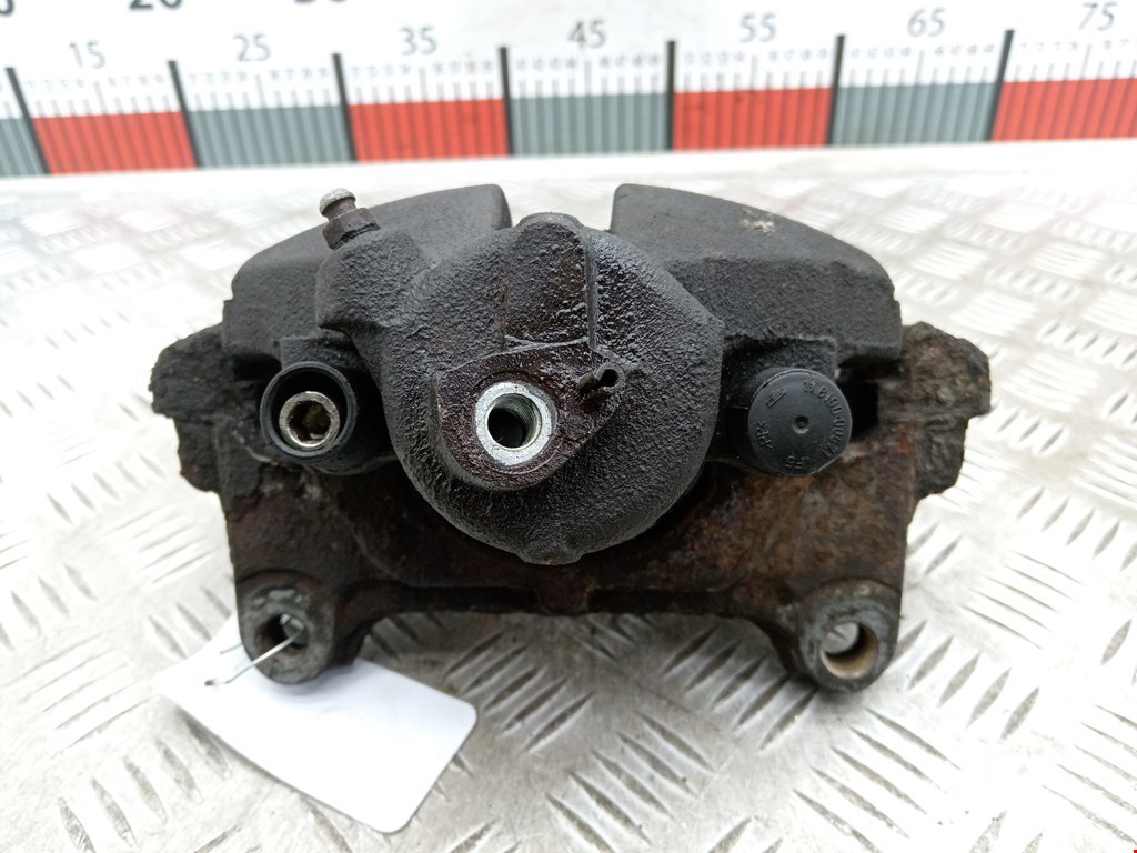 Суппорт передний левый VOLKSWAGEN Passat B6 2005-2011