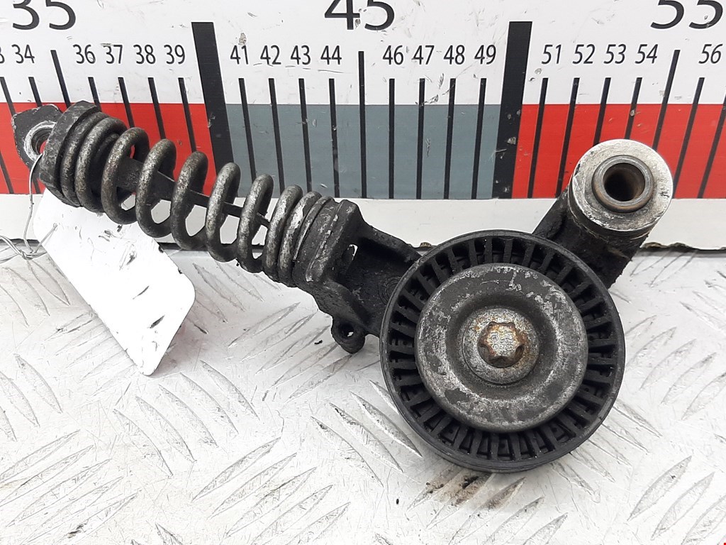 Натяжитель ремня генератора (приводного поликлинового ремня Opel Corsa D (2006-2014)