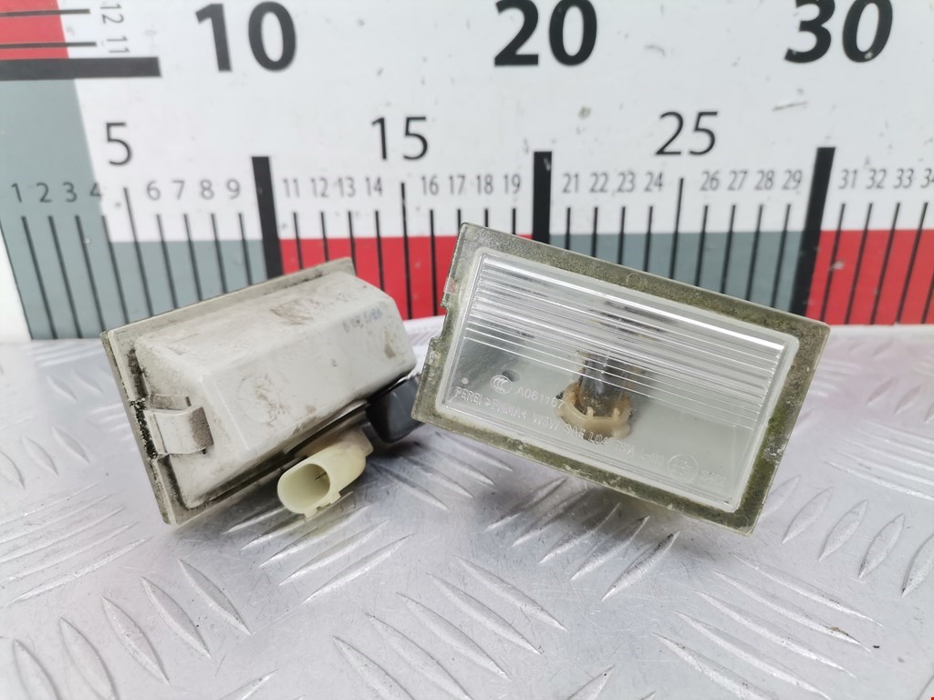 Фонарь подсветки номера LAND ROVER Discovery III 2005-2009