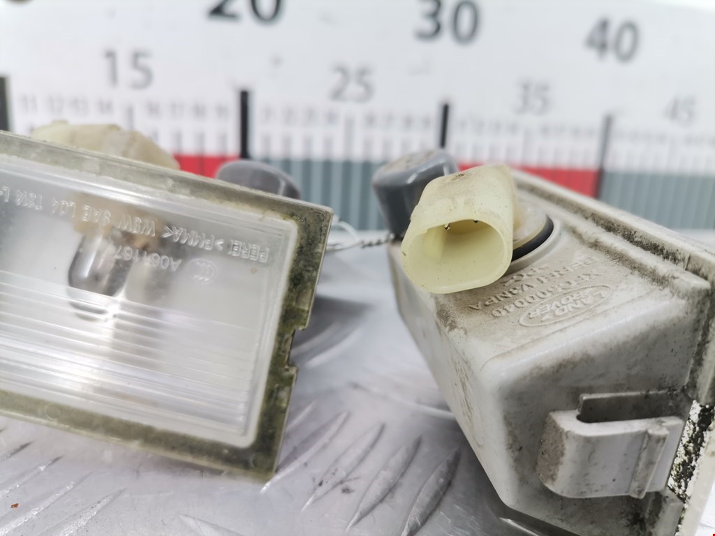 Фонарь подсветки номера LAND ROVER Discovery III 2005-2009