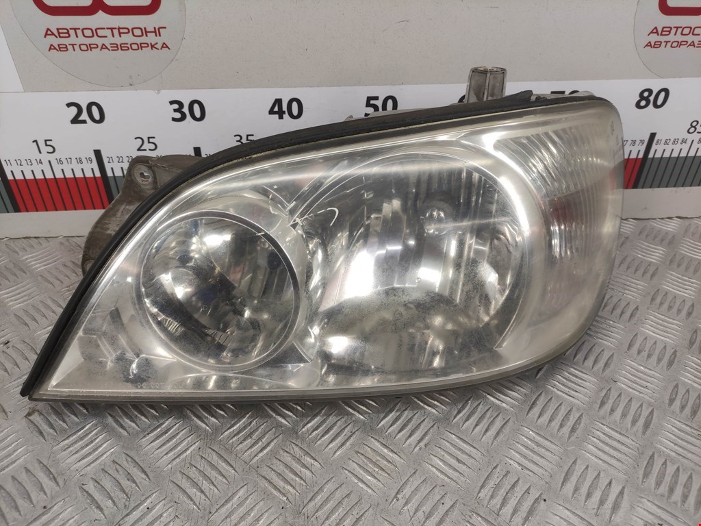 Фара левая KIA Carnival I 1999-2005