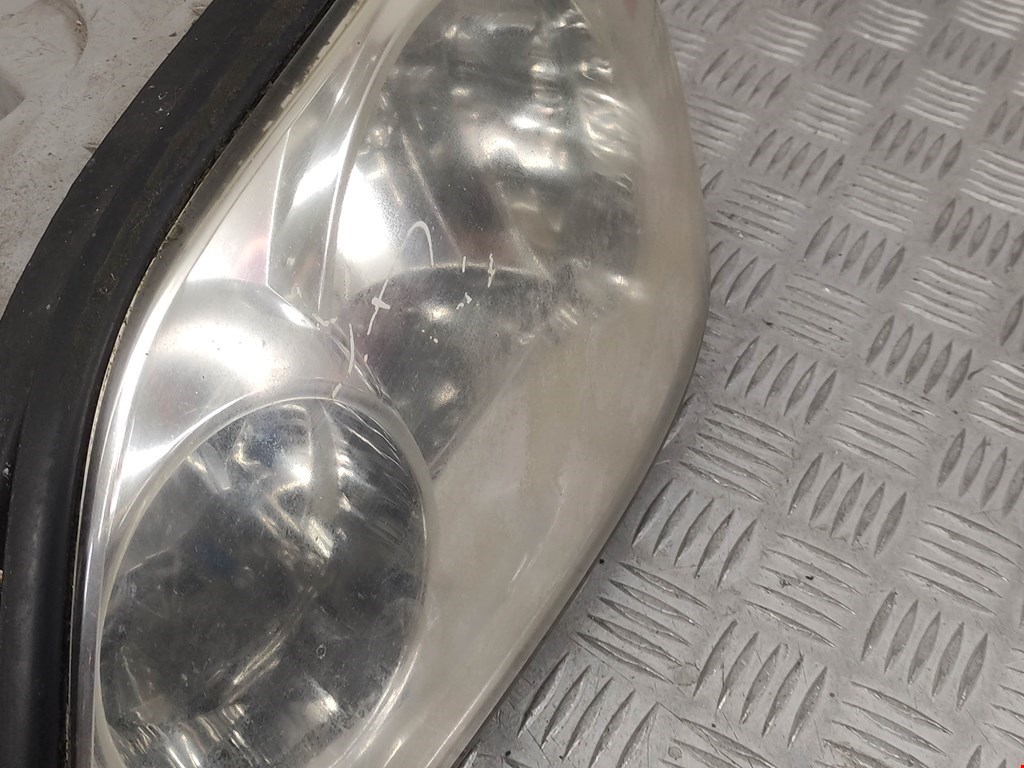 Фара левая KIA Carnival I 1999-2005