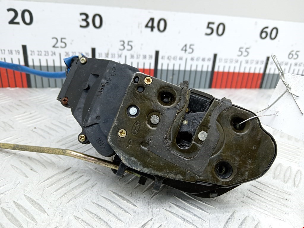 Замок двери передней правой KIA Carnival I 1999-2005