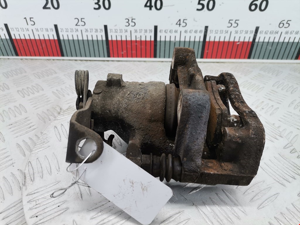 Суппорт задний левый OPEL Astra H/Family 2004-2015