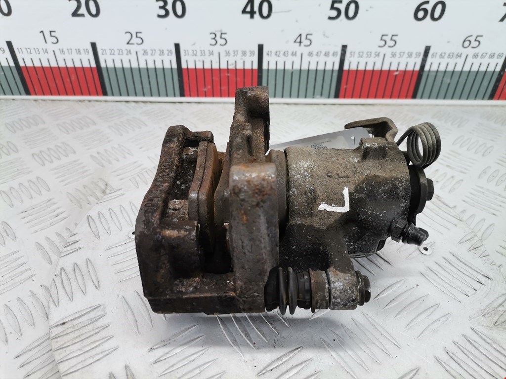 Суппорт задний левый OPEL Astra H/Family 2004-2015