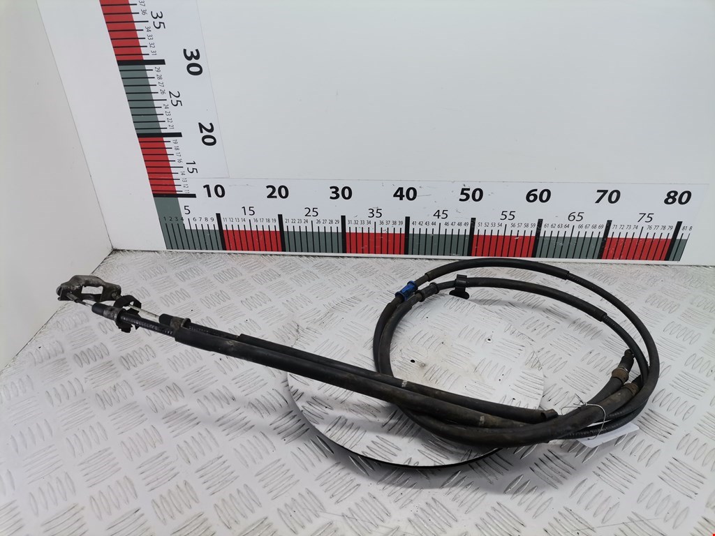 Трос стояночного тормоза левый/правый OPEL Astra H/Family 2004-2015