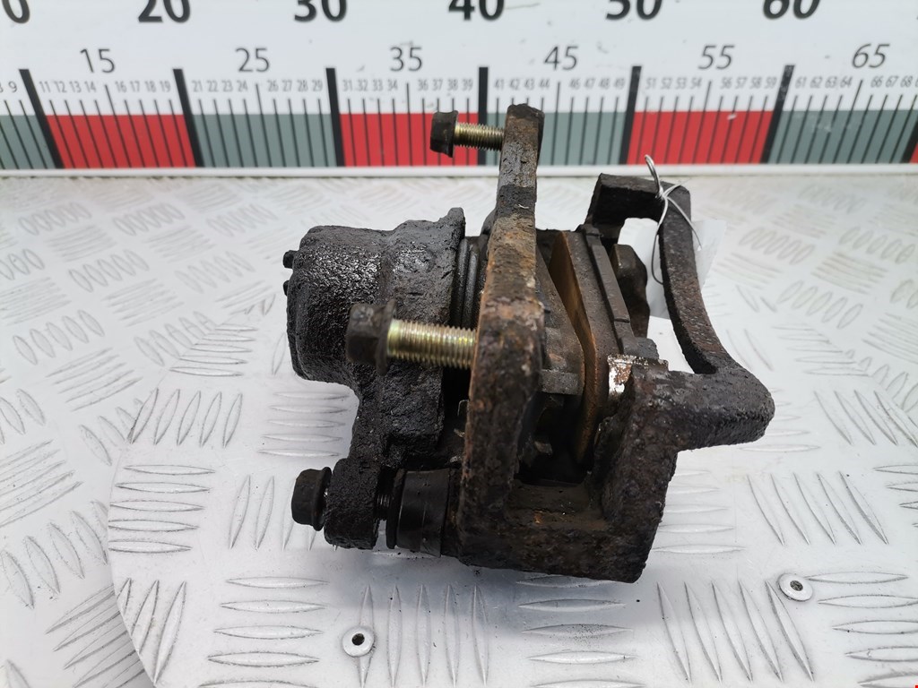 Суппорт задний левый KIA Sorento 2002-2009