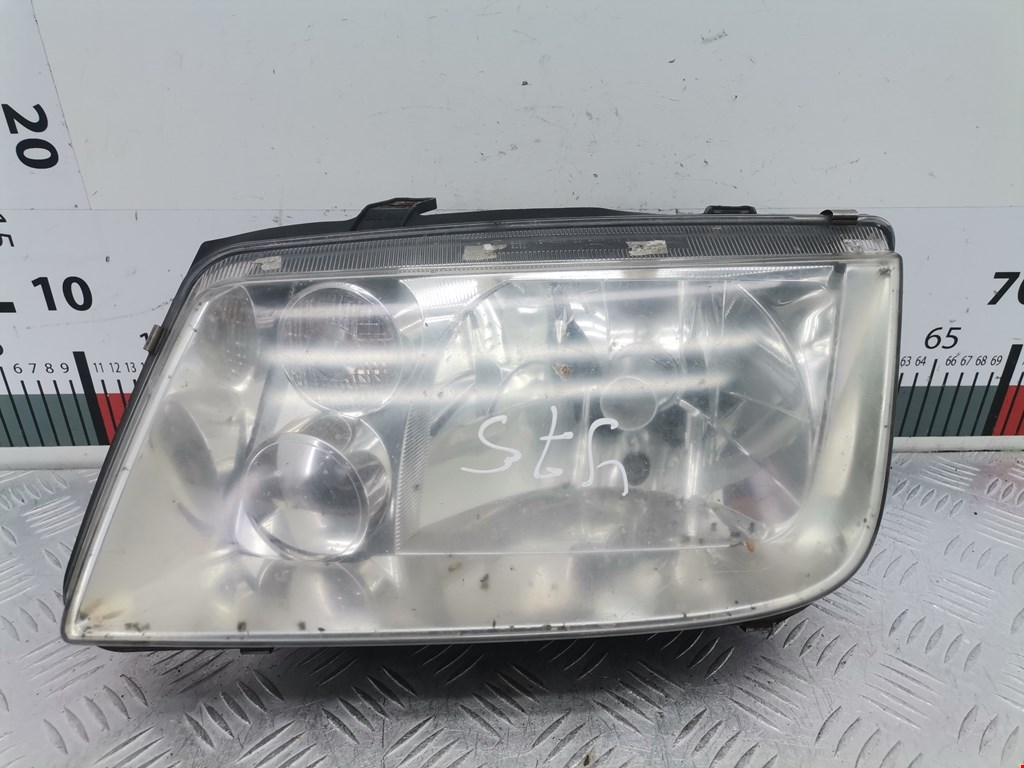 Фара левая VOLKSWAGEN Bora 1998-2005