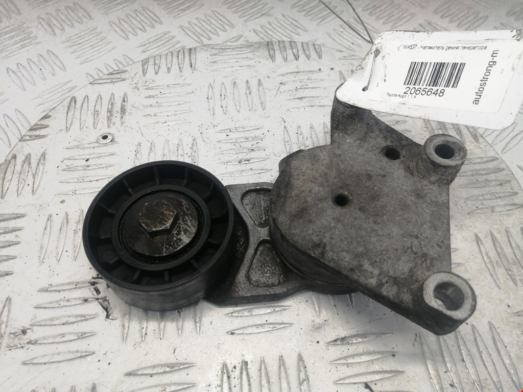Натяжитель ремня генератора (приводного поликлинового ремня Toyota Aygo 1 (2005-2014)
