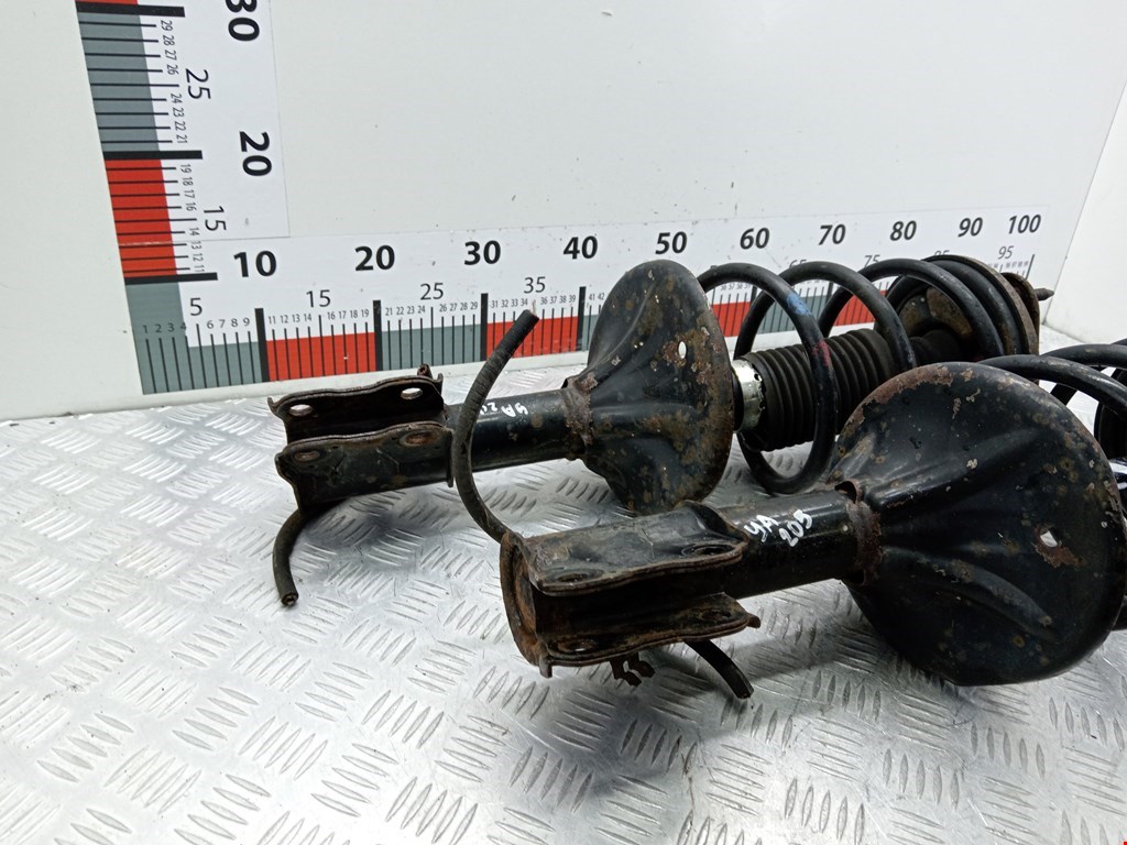 Амортизатор передний левый MITSUBISHI Lancer IX CS 2000-2010