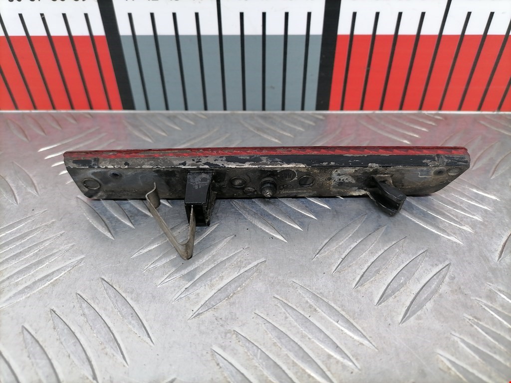 Отражатель в бампер задний левый OPEL Combo D 2011-2017