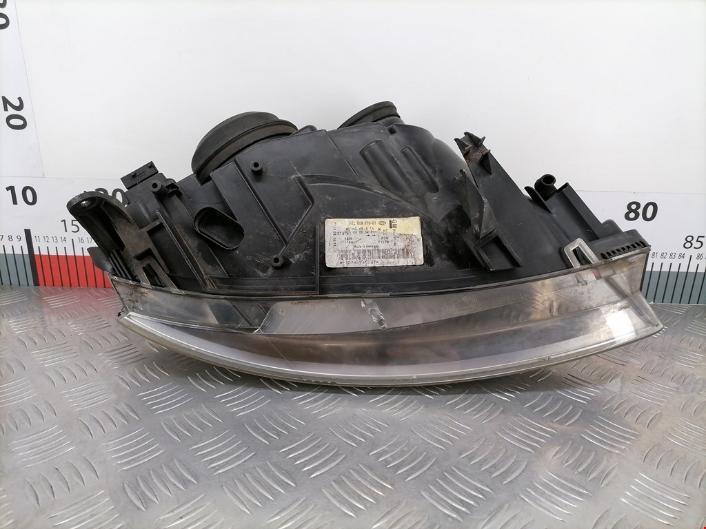 Фара левая SAAB 9-3 2002-2014