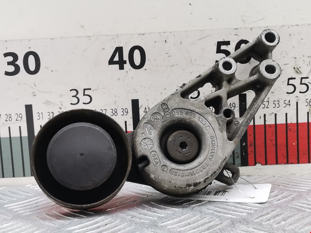 Натяжитель ремня генератора (приводного поликлинового ремня Volkswagen Passat 5 (1996-2000)