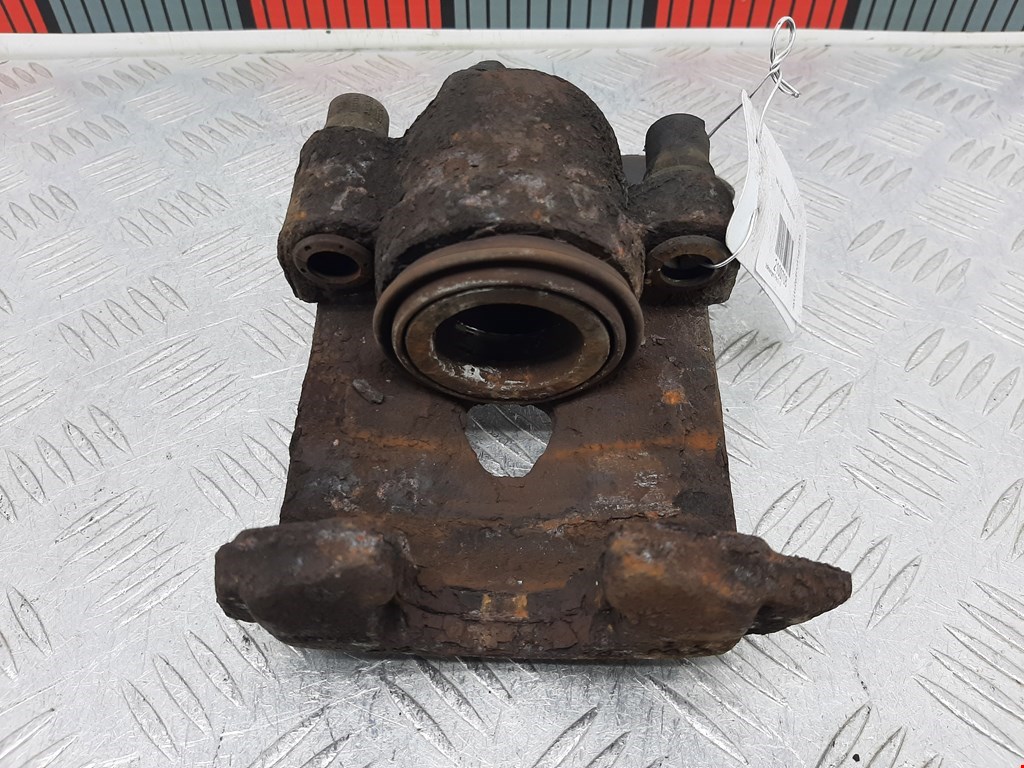 Суппорт передний левый VOLKSWAGEN Polo III 1994-2001