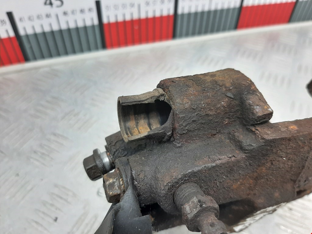 Суппорт передний левый VOLKSWAGEN Polo III 1994-2001