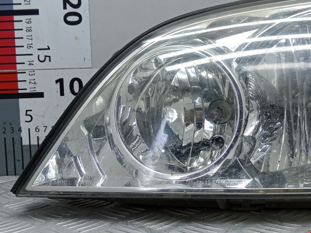Фара левая KIA Carnival I 1999-2005