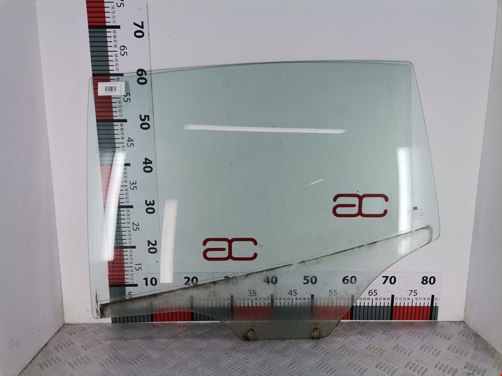 Стекло двери заднее левое DAEWOO Tacuma 2001-2011