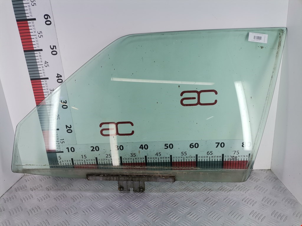 Стекло двери переднее левое SAAB 9000 1984-1991