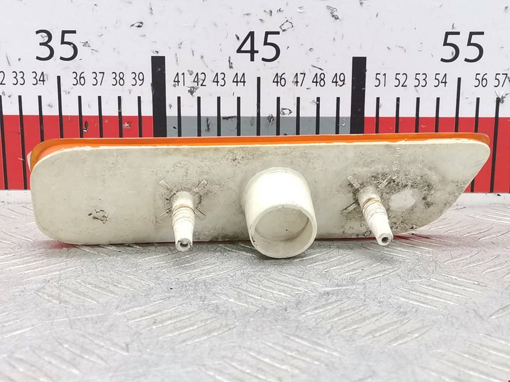 Отражатель в бампер задний левый CHRYSLER Neon 1994-1999