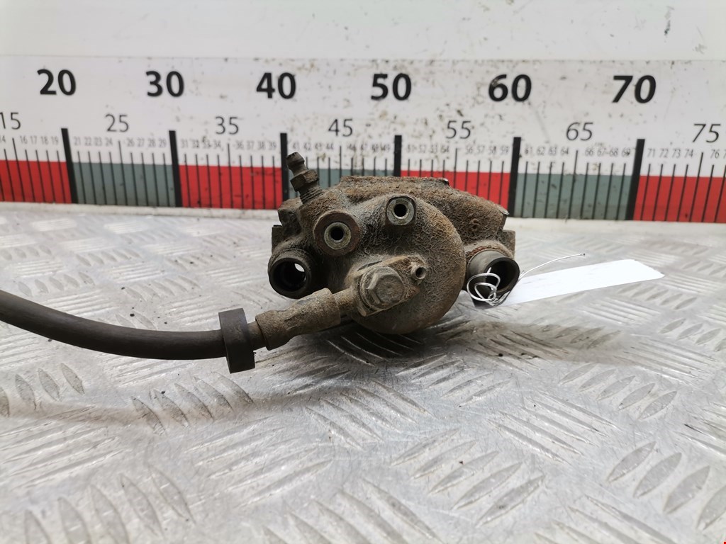 Суппорт передний левый VOLKSWAGEN Polo III 1994-2001