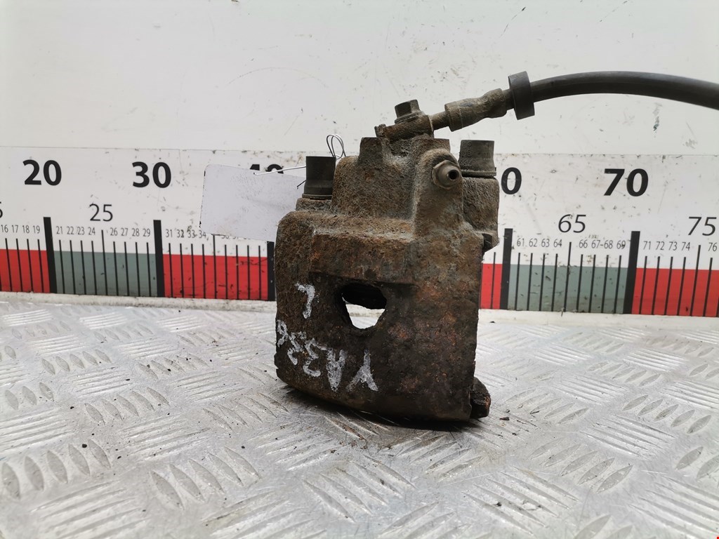 Суппорт передний левый VOLKSWAGEN Polo III 1994-2001