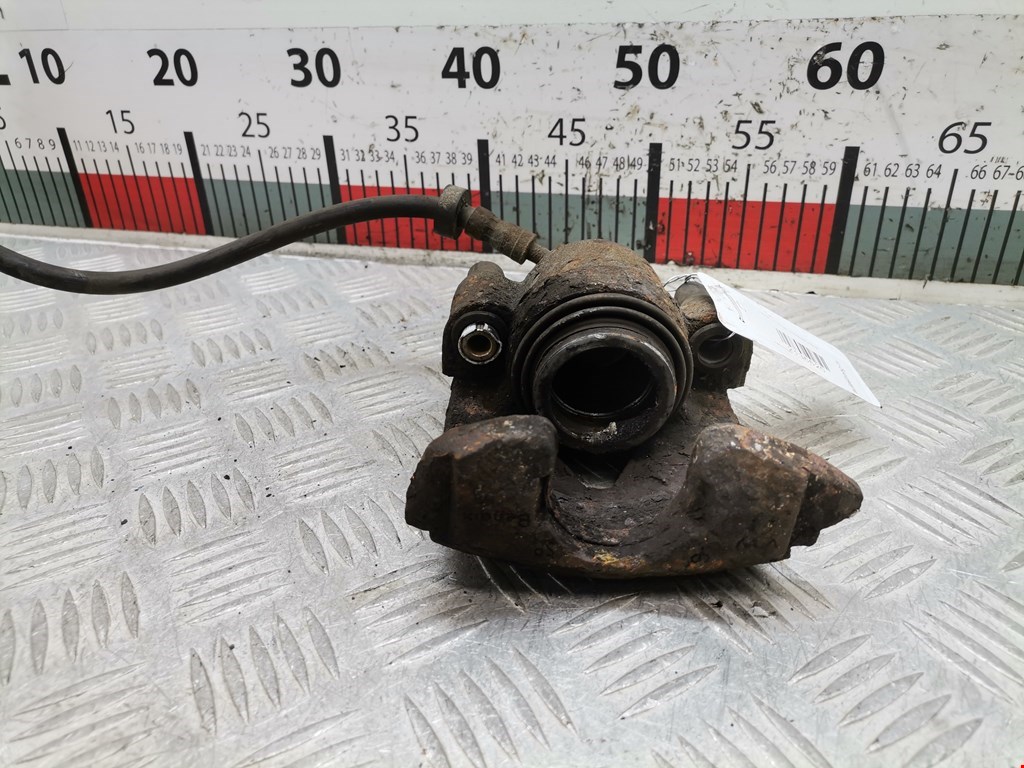 Суппорт передний левый VOLKSWAGEN Polo III 1994-2001