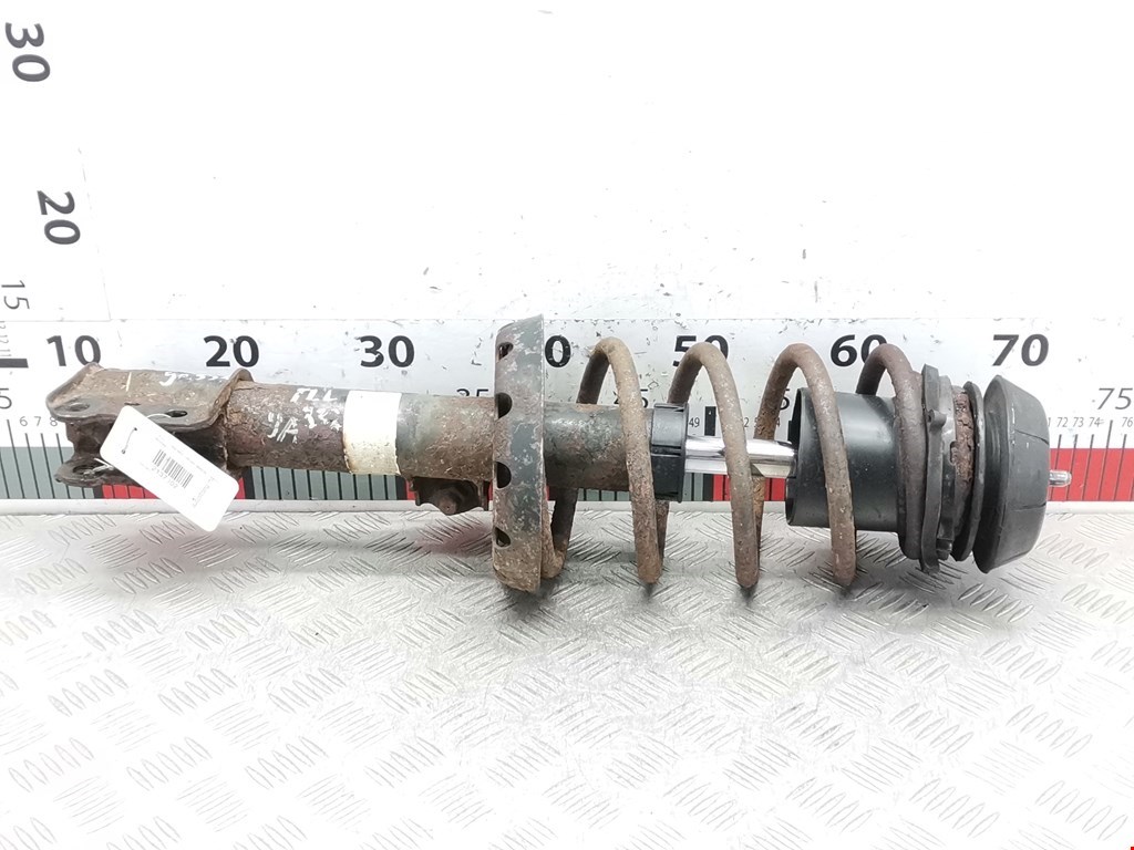 Стойка амортизатора переднего левого Opel Astra G (1998-2004)