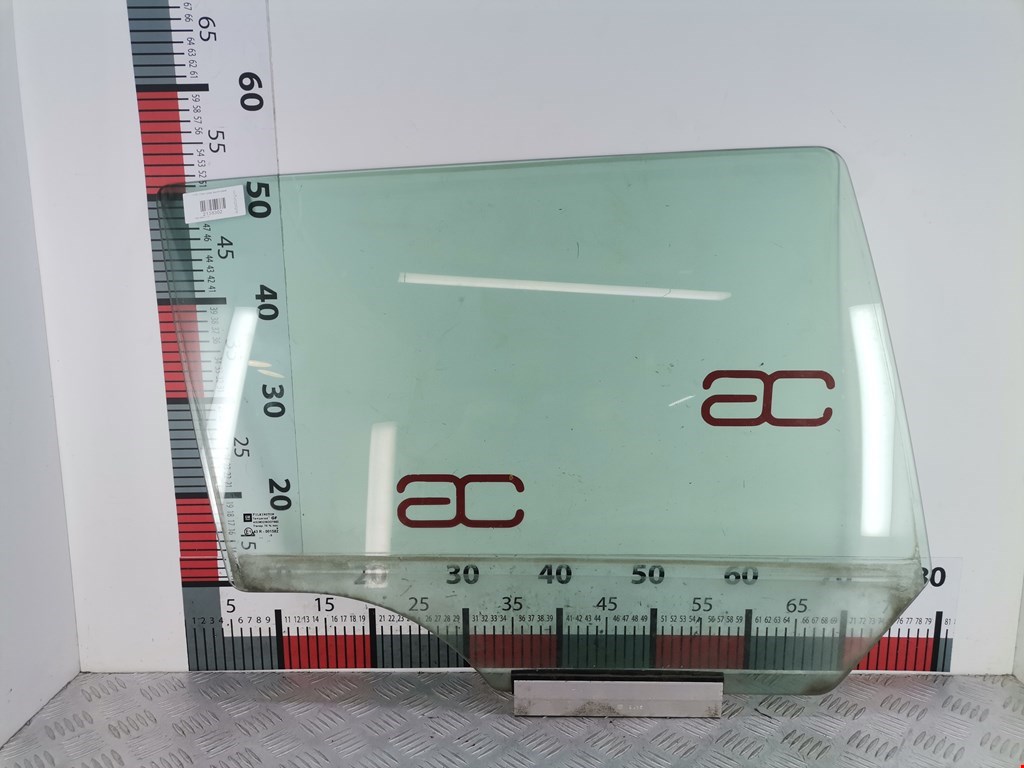 Стекло двери задней правой Opel Astra H (2004-2014)