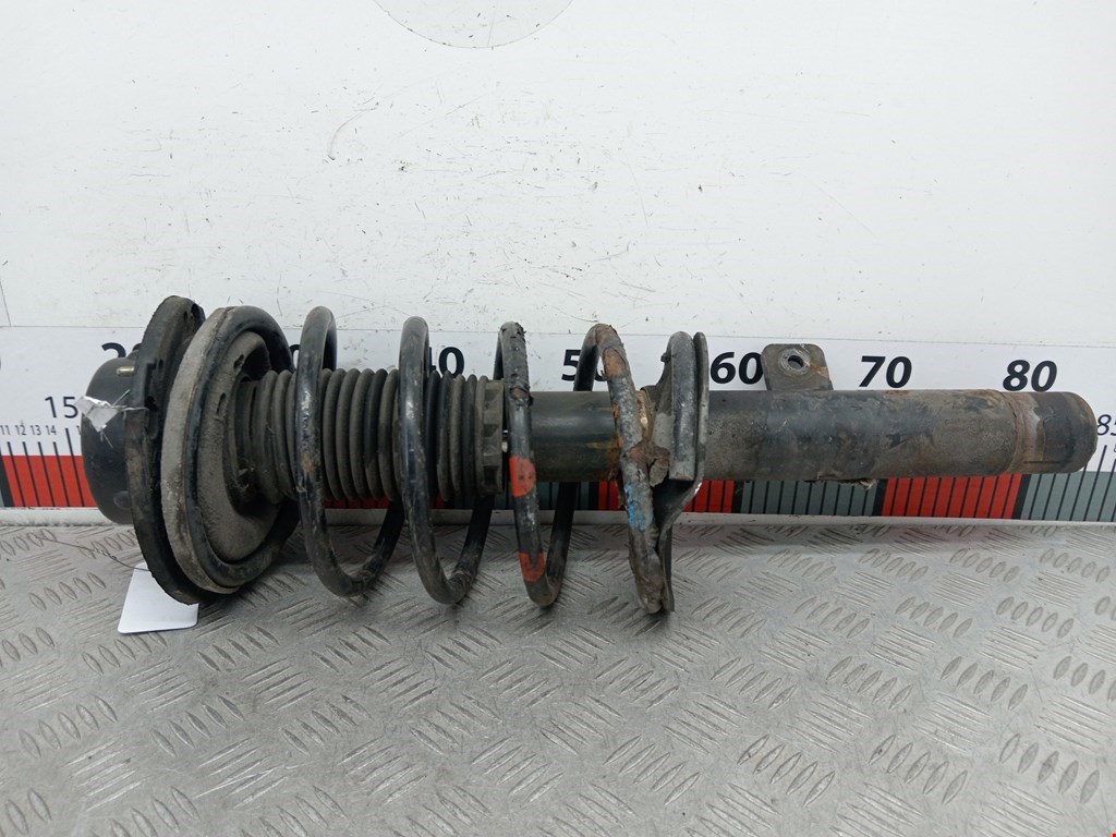 Стойка амортизатора переднего левого Peugeot 206 (1998-2006)