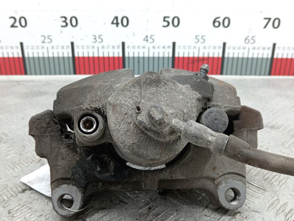 Суппорт передний правый VOLKSWAGEN Passat B6 2005-2011