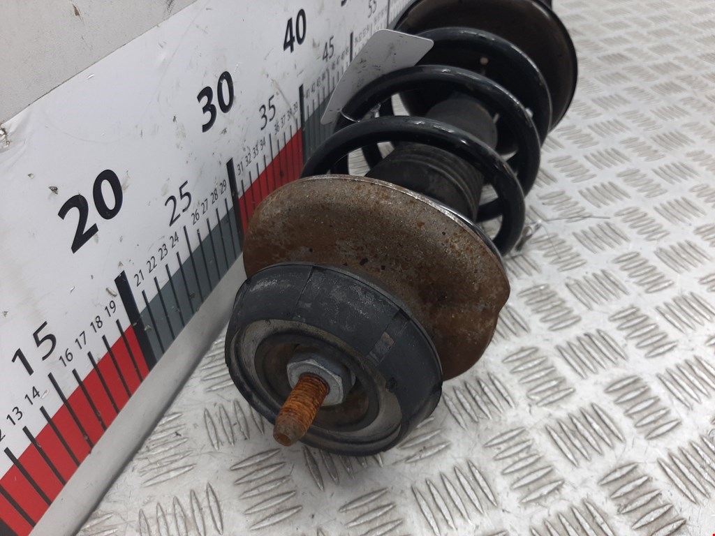 Амортизатор передний левый RENAULT Sandero 2009-2014