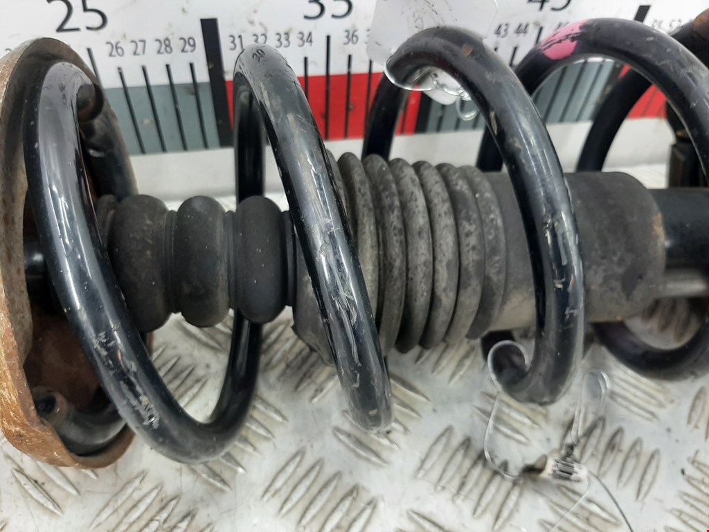 Амортизатор передний левый RENAULT Sandero 2009-2014