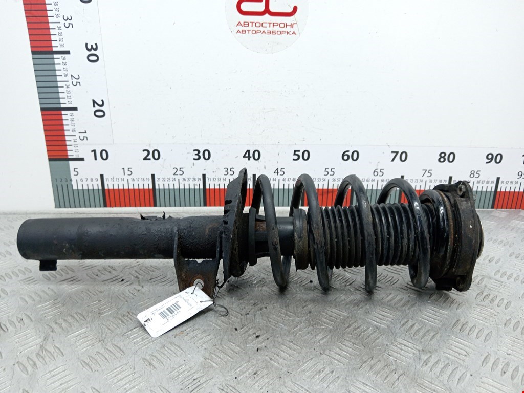 Амортизатор передний левый VOLKSWAGEN Passat B6 2005-2011