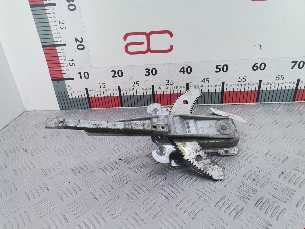 Стеклоподъемник задний левый NISSAN Micra K12 2003-2010