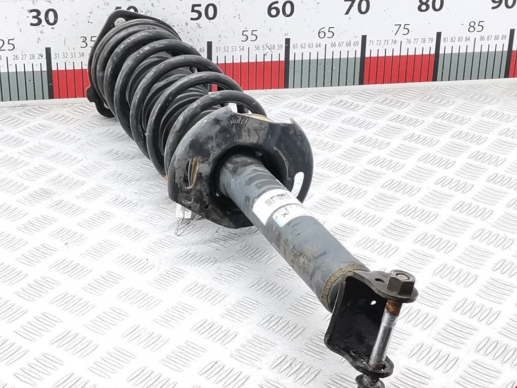 Амортизатор задний левый INFINITI Q50 2013-н.в.