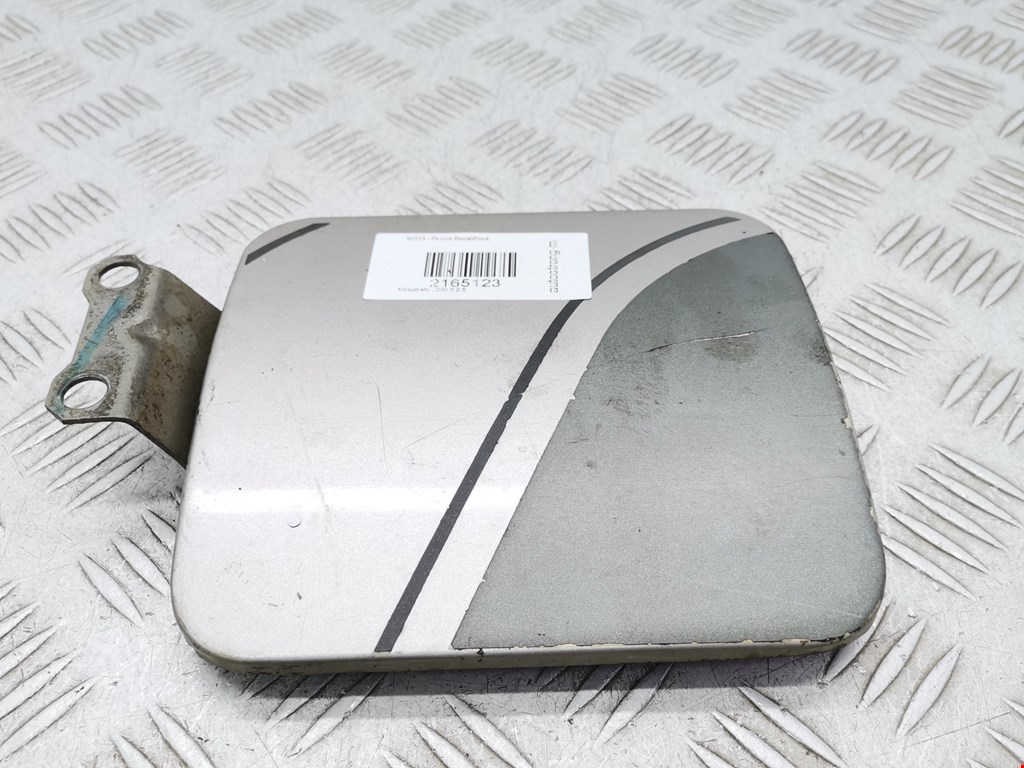 Лючок бензобака Mitsubishi L200 3 (1996-2006)