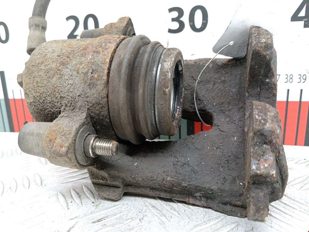 Суппорт передний правый VOLKSWAGEN Polo IV 2001-2009