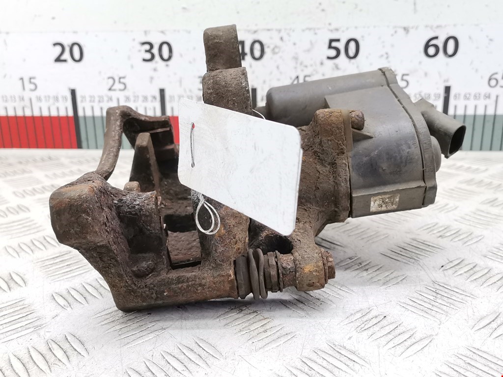 Суппорт задний левый VOLKSWAGEN Passat B6 2005-2011