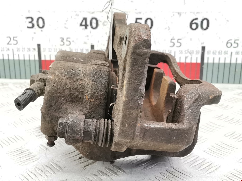 Суппорт передний левый SSANG YONG Rodius 2004-2013