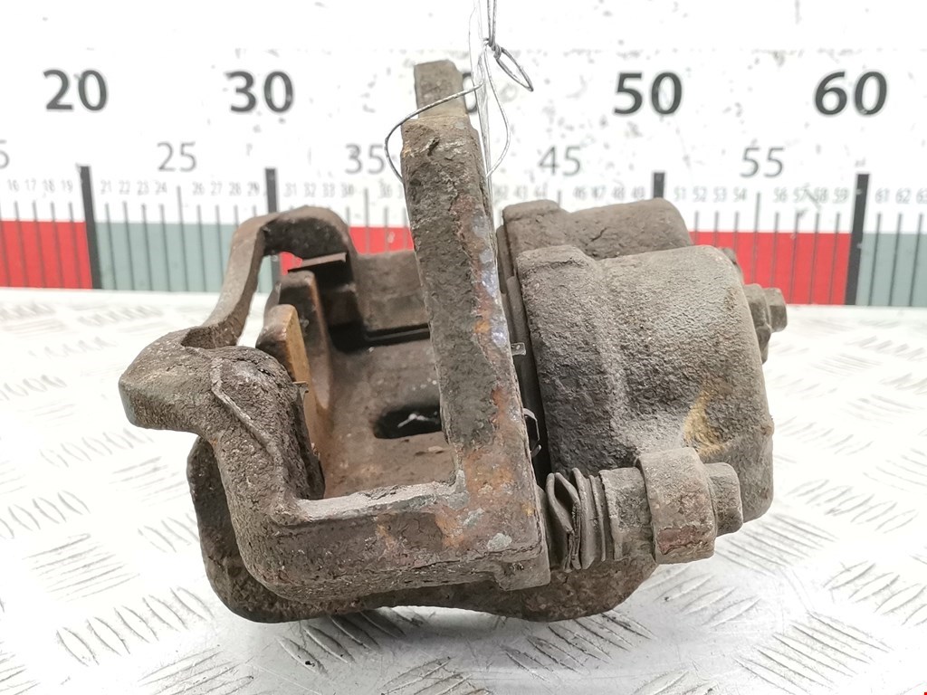 Суппорт передний левый SSANG YONG Rodius 2004-2013