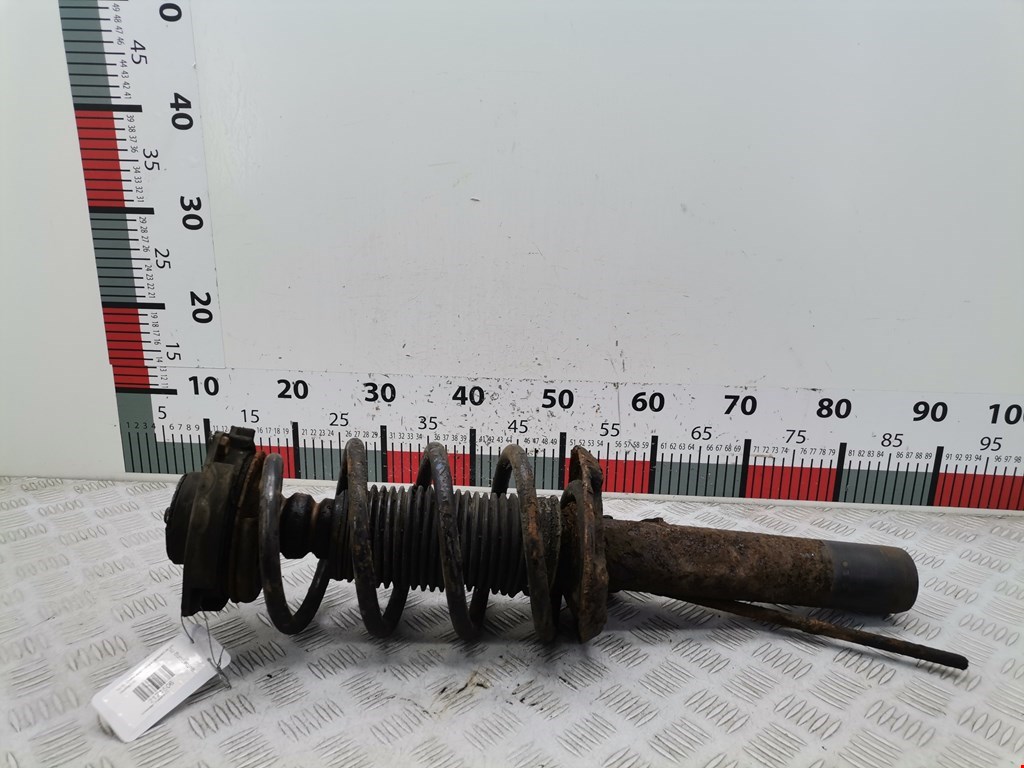 Амортизатор передний левый VOLKSWAGEN Passat B6 2005-2011