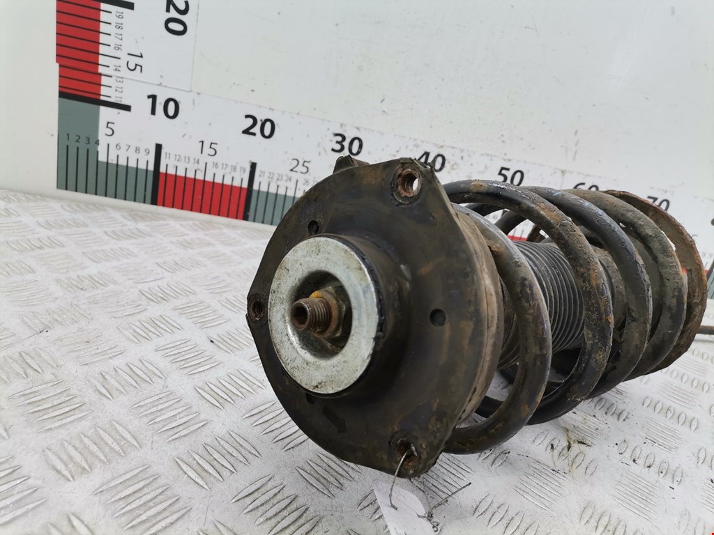 Амортизатор передний левый VOLKSWAGEN Passat B6 2005-2011