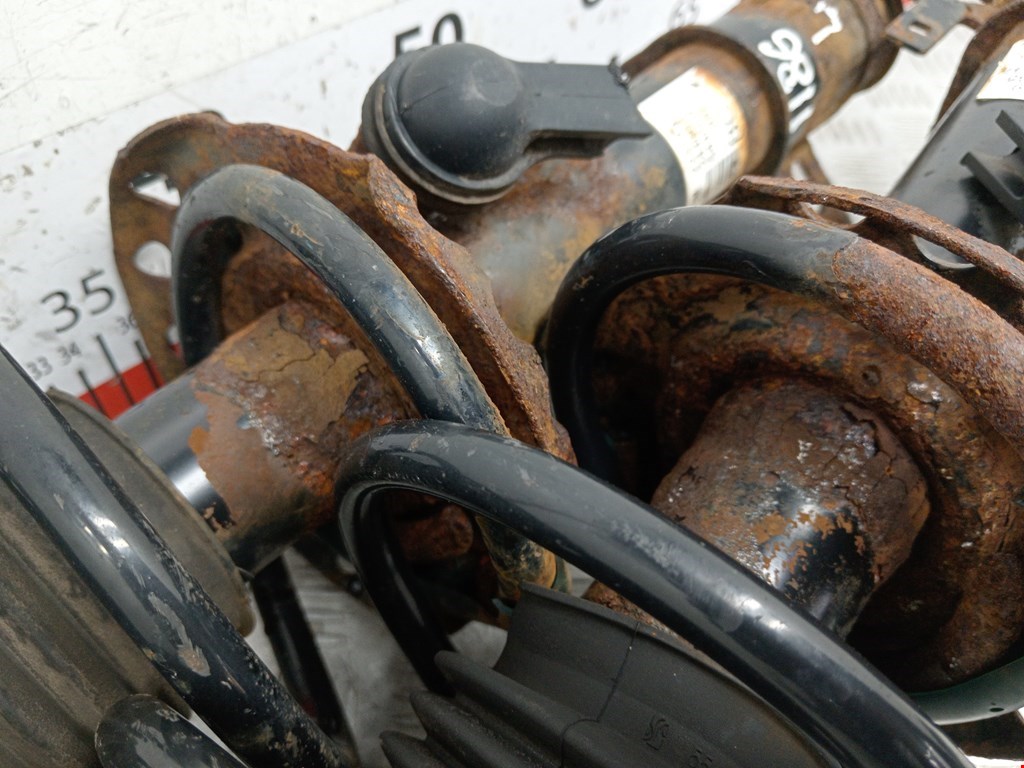 Амортизатор передний левый OPEL Astra H/Family 2004-2015